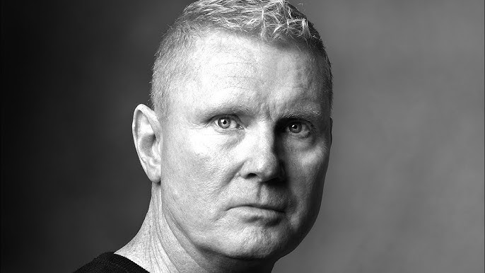 Black-and-white portrait of John Red Shea.